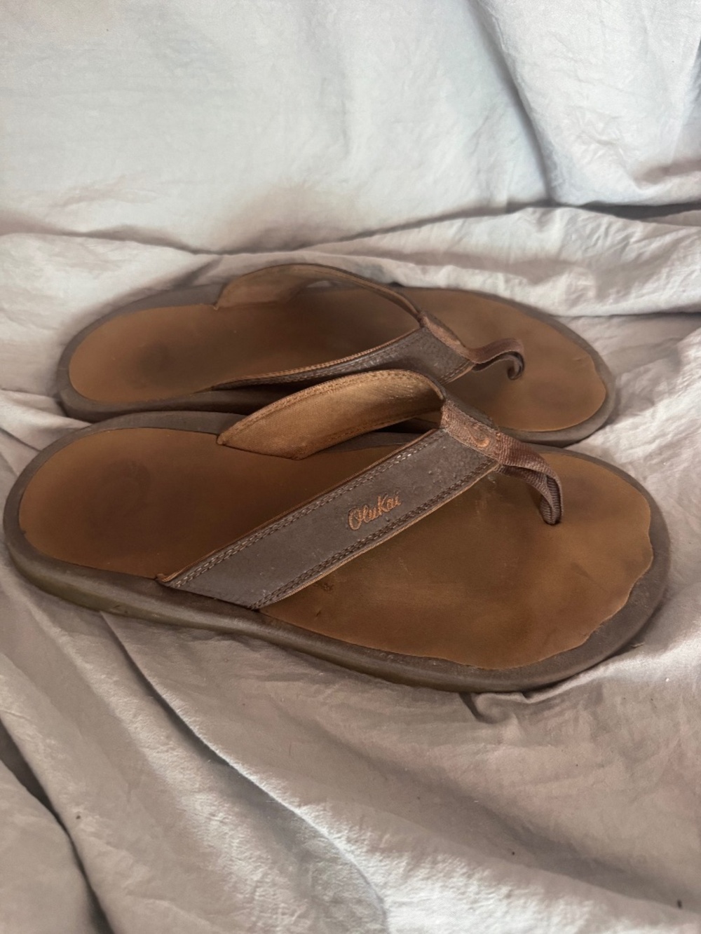 Men's Olukai flip flops Sz 10